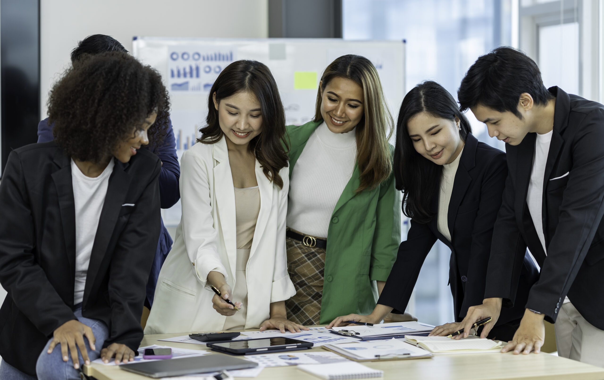 Business people working and brainstorming in office