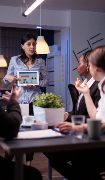 Close-up of a trainer using a presentation slide to explain concepts in a corporate training session in Singapore